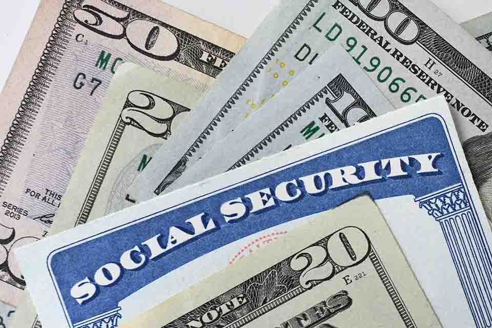 ssi is represented here by a limited mixture of us currency amounts and the top portion of a social security card
